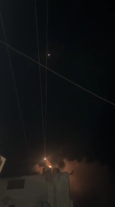 Israeli warplanes perform a display in the skies over the Gaza Strip from north to south, on the night of the October 7 anniversary
