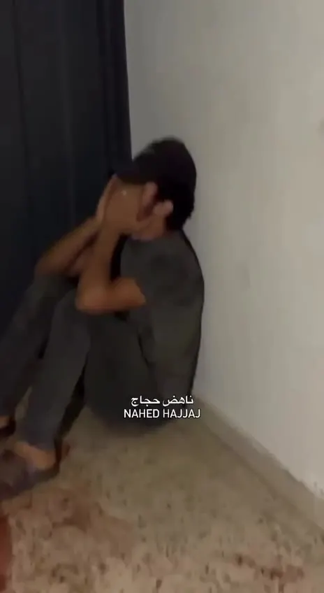 A young man’s cries at the door of the morgue refrigerator after his mother was martyred in an Israeli bombing of a house in the Sabra neighborhood in Gaza City a short while ago.