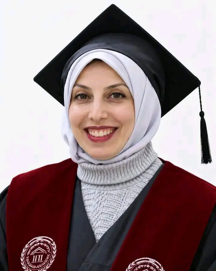 De martelares Yasmin Khamis Al-Boubou, hoofd van de afdeling multimedia aan de Universiteit van Palestina, die om het leven kwam bij het bombarderen van een woonappartement in de omgeving van de Haidar-rotonde in de wijk Al-Rimal, ten westen van de stad Gaza — Afbeelding 1